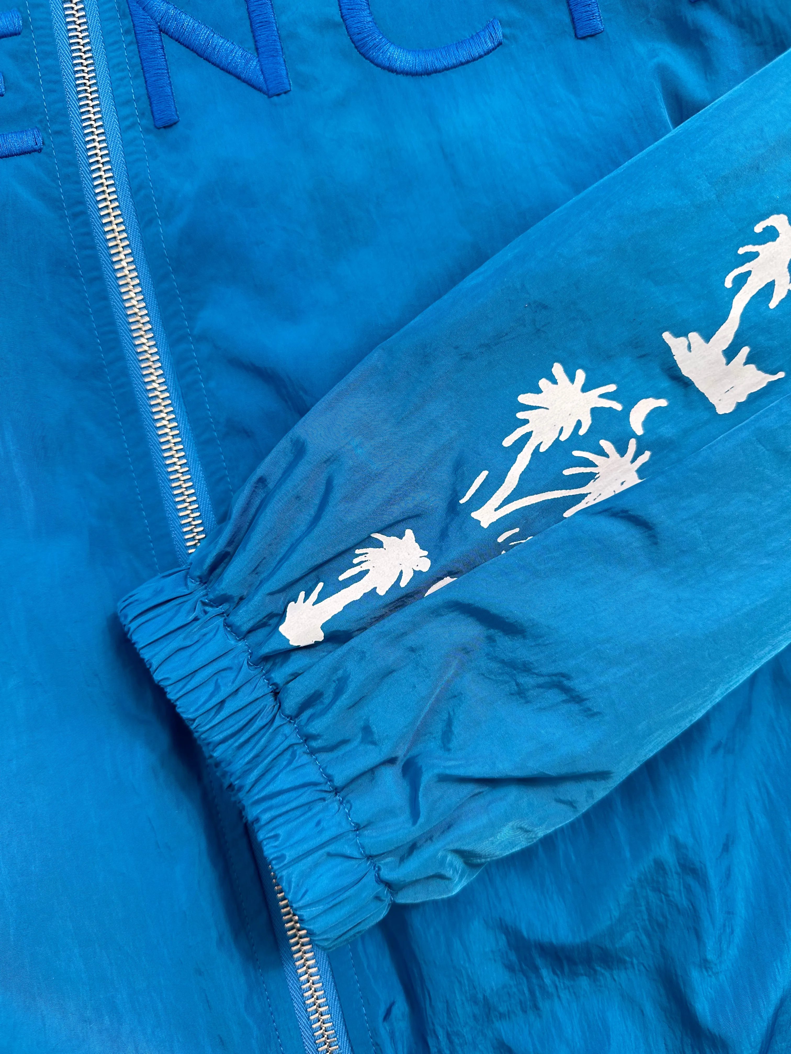 Giacca A Vento Blu Uomo Con Logo Ricamato