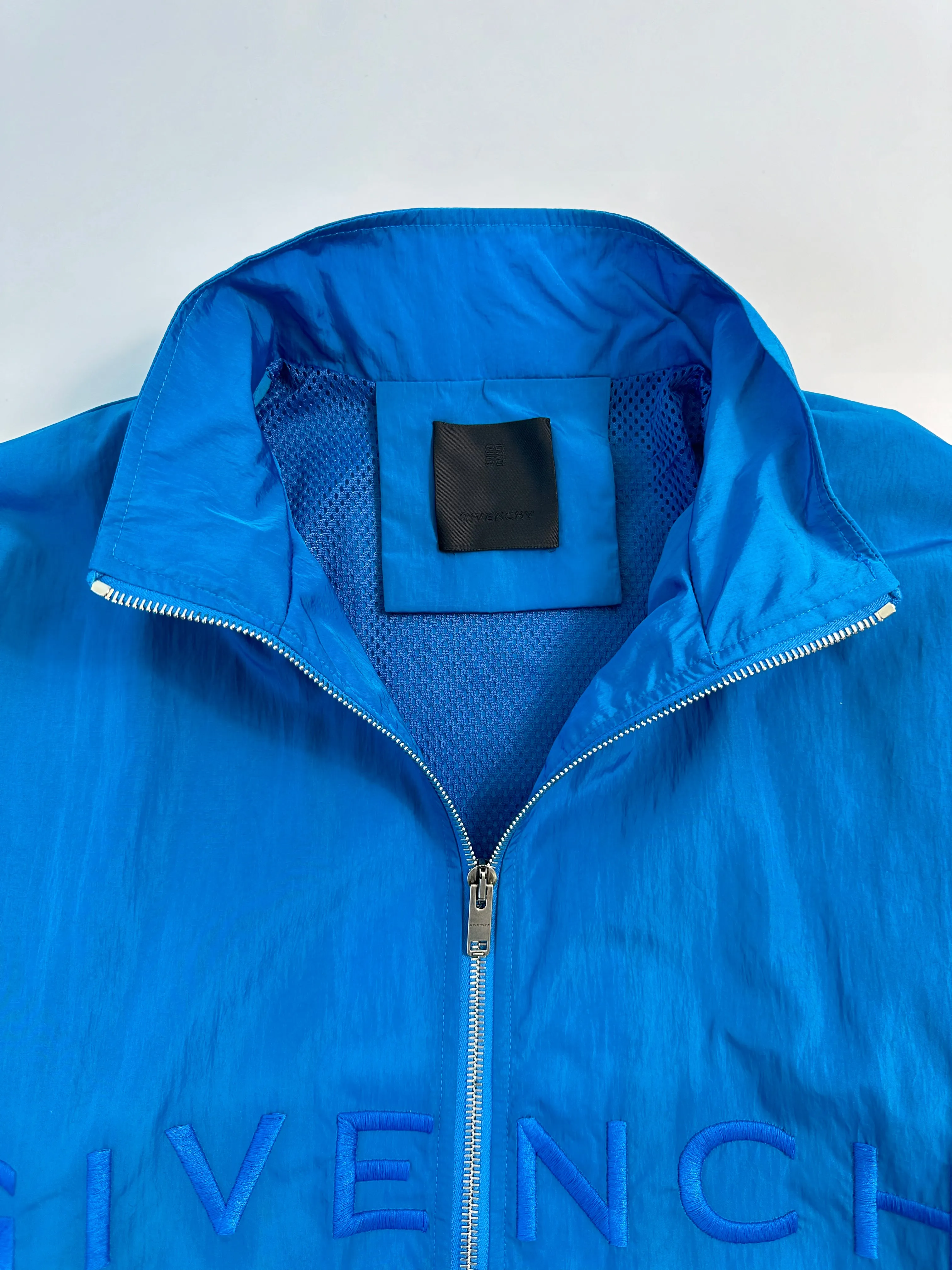 Giacca A Vento Blu Uomo Con Logo Ricamato